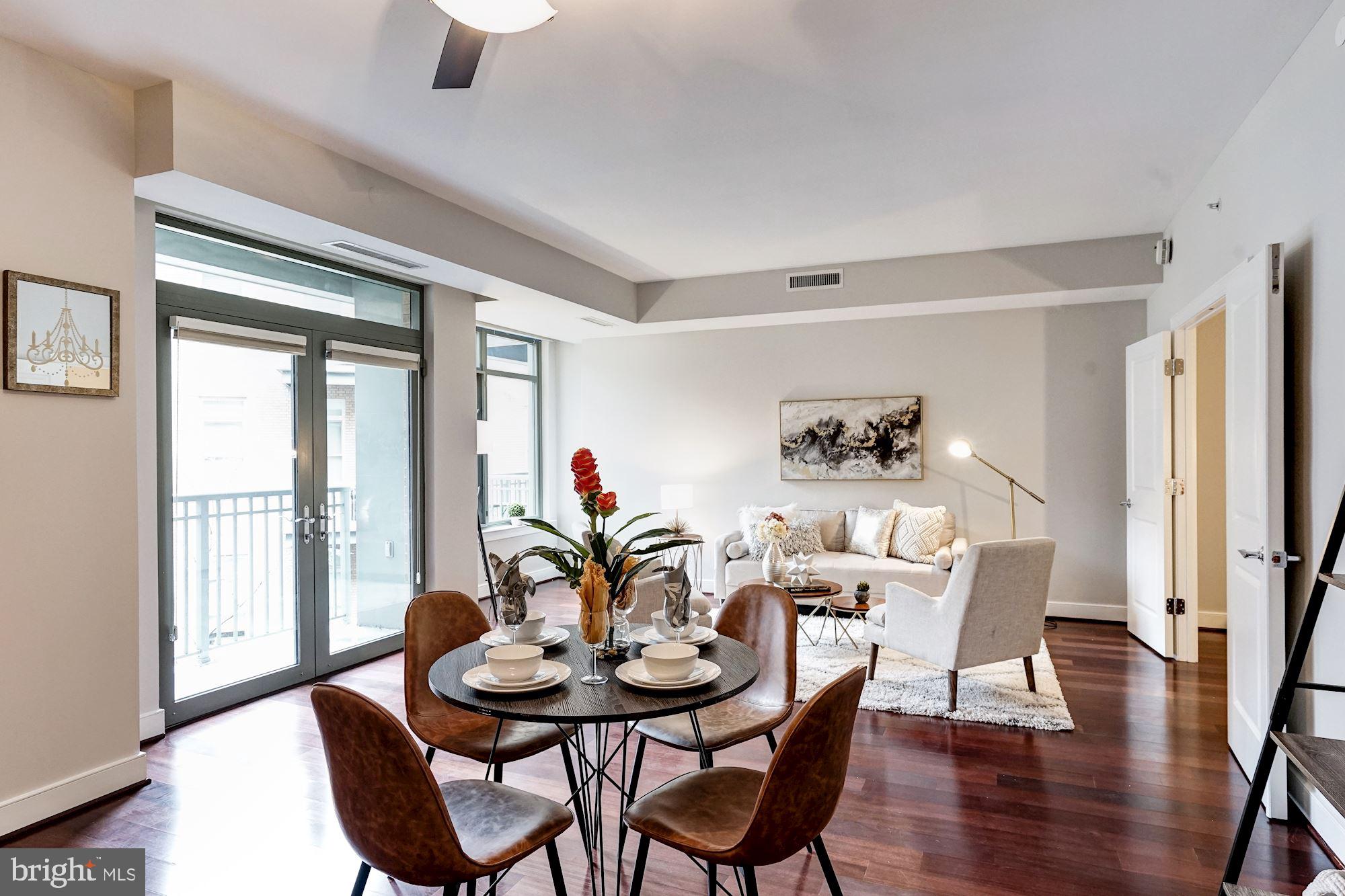 2425 L Street Northwest, Unit 430 Washington, DC 20037 - Photo 6 of 29 Dining Area/Living Room/Balcony