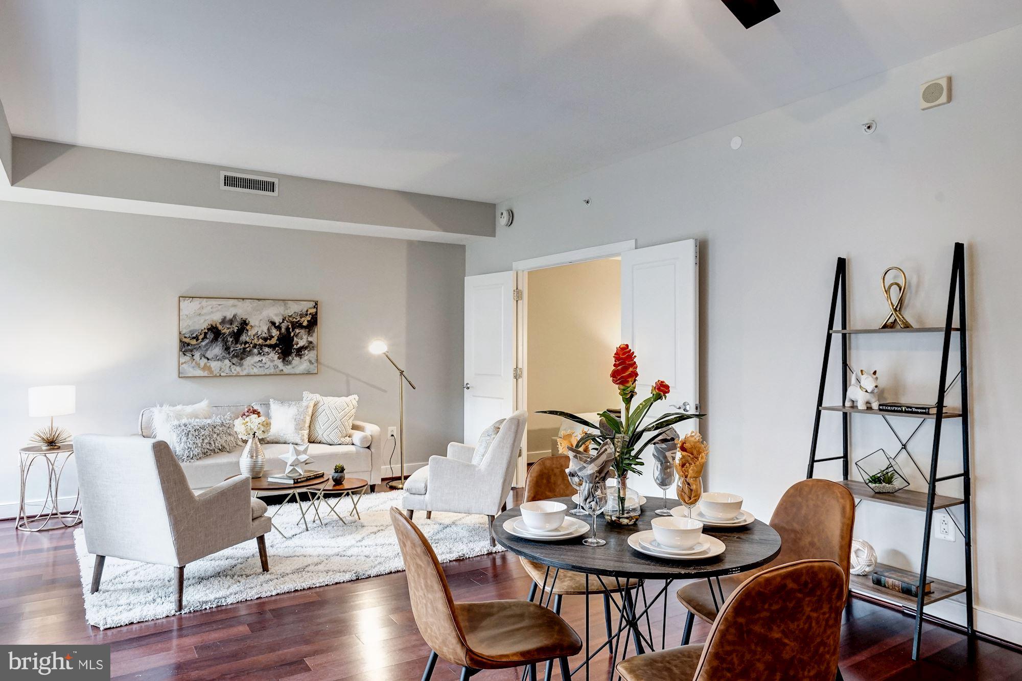 2425 L Street Northwest, Unit 430 Washington, DC 20037 - Photo 7 of 29 Dining Area/Living Room
