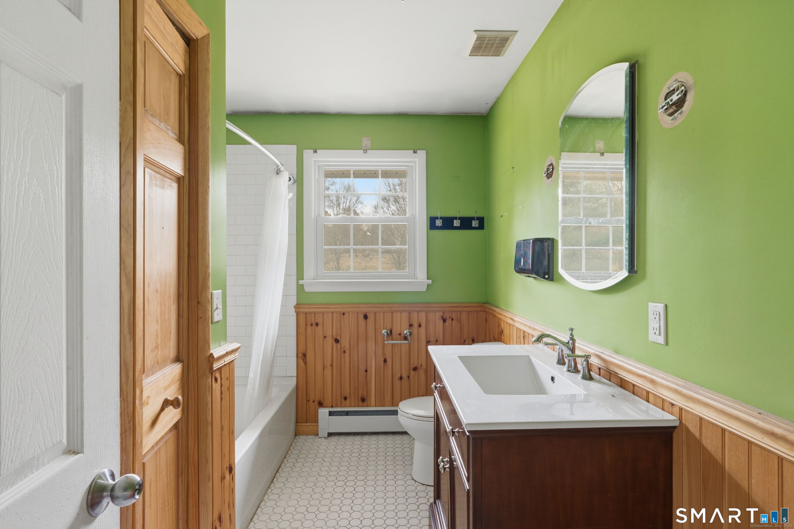 487 Buff Cap Road Tolland, CT 06084 - Photo 12 of 22 a bathroom with a sink and a mirror