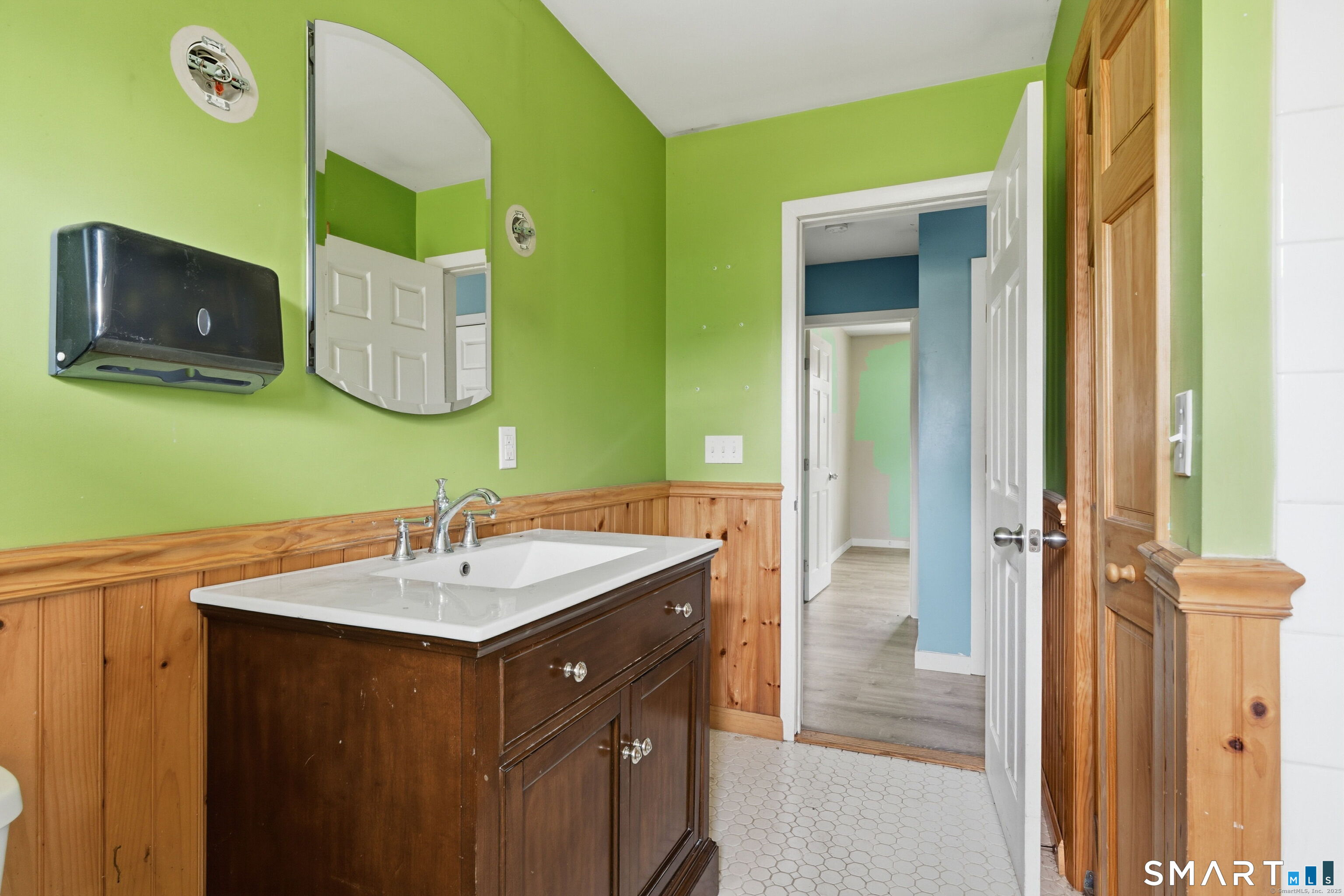 487 Buff Cap Road Tolland, CT 06084 - Photo 14 of 22 a bathroom with a sink and a mirror