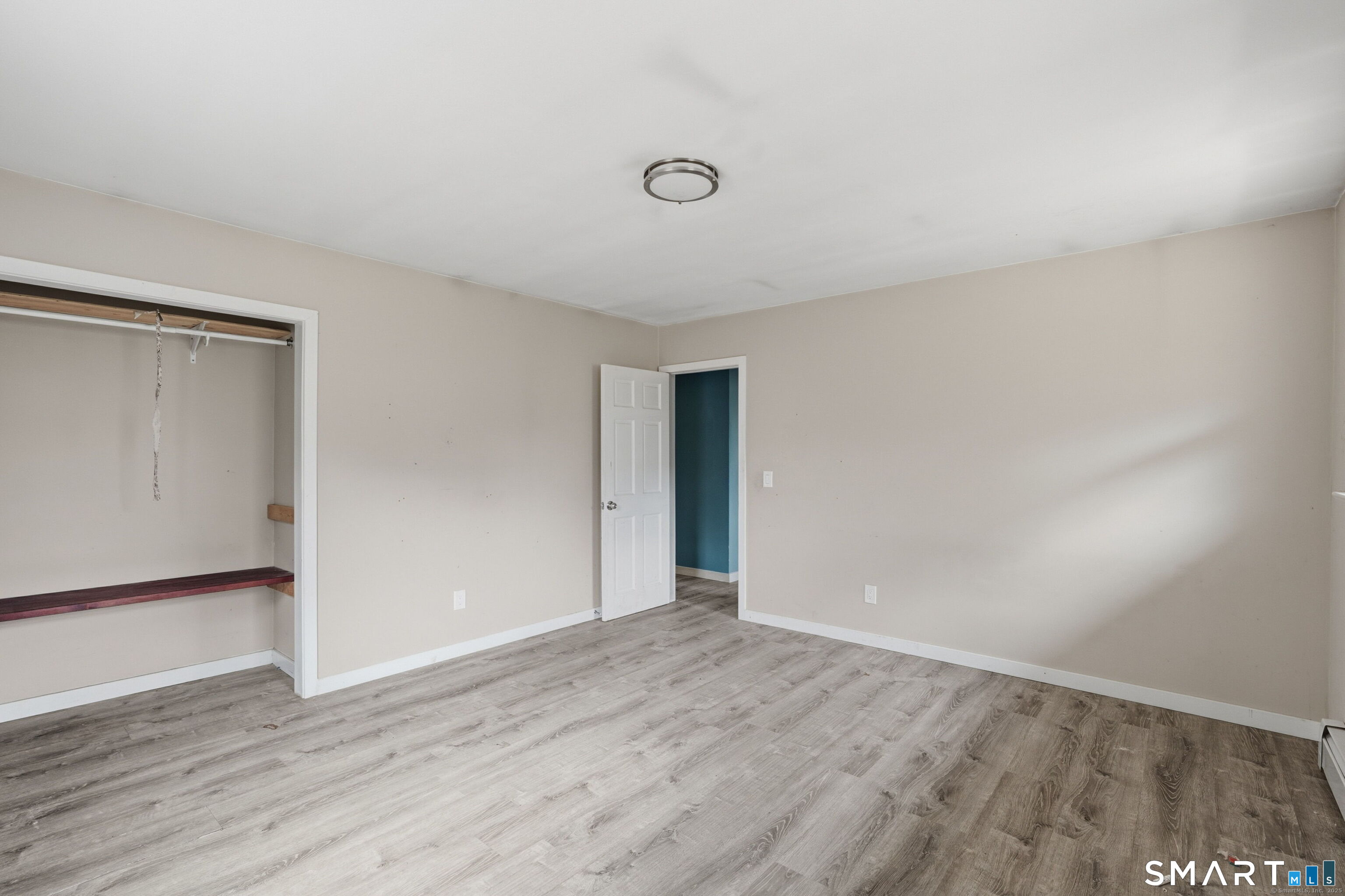 487 Buff Cap Road Tolland, CT 06084 - Photo 19 of 22 wooden floor in an empty room
