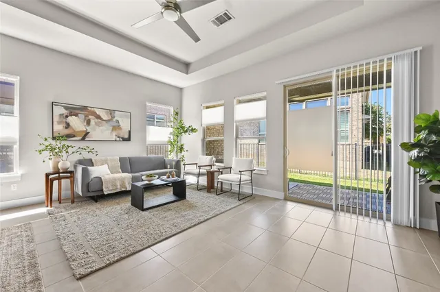 a living room with furniture and a table