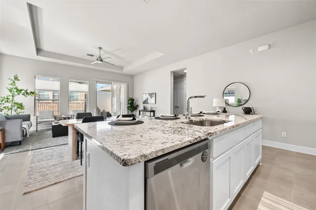 a view of living room with granite countertop furniture and couch