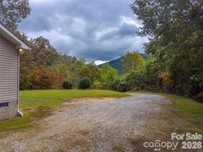 179 Fresh Water Rdg Road Whittier, NC 28789 - Photo 40 of 48 a view of an outdoor space with a yard
