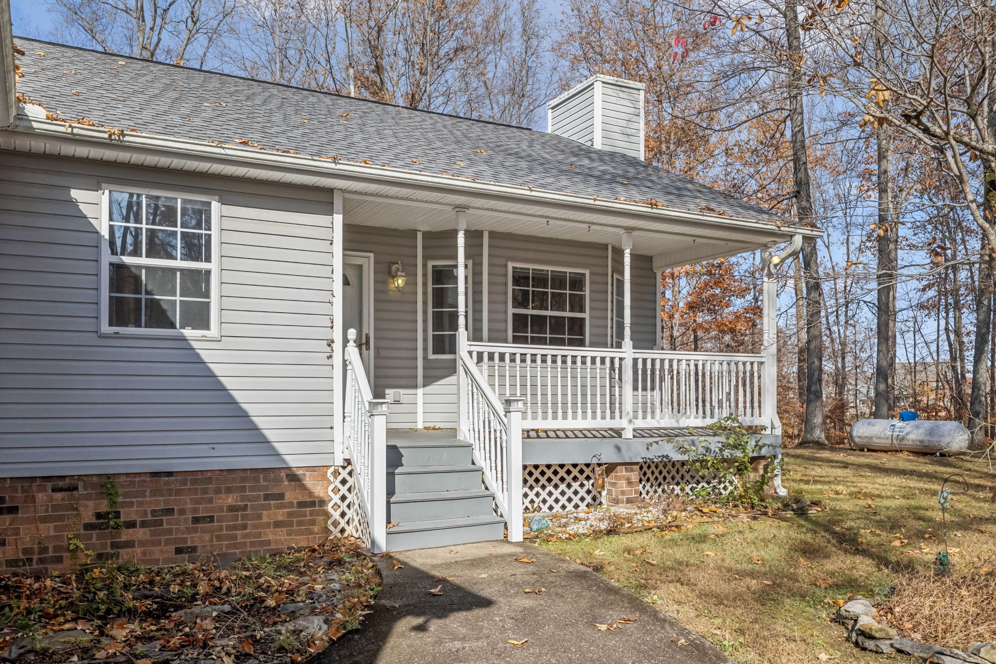 7399 Forest Glenn Road Fairview, TN 37062 - Photo 13 of 75 a view of a house with wooden fence and floor to ceiling windows