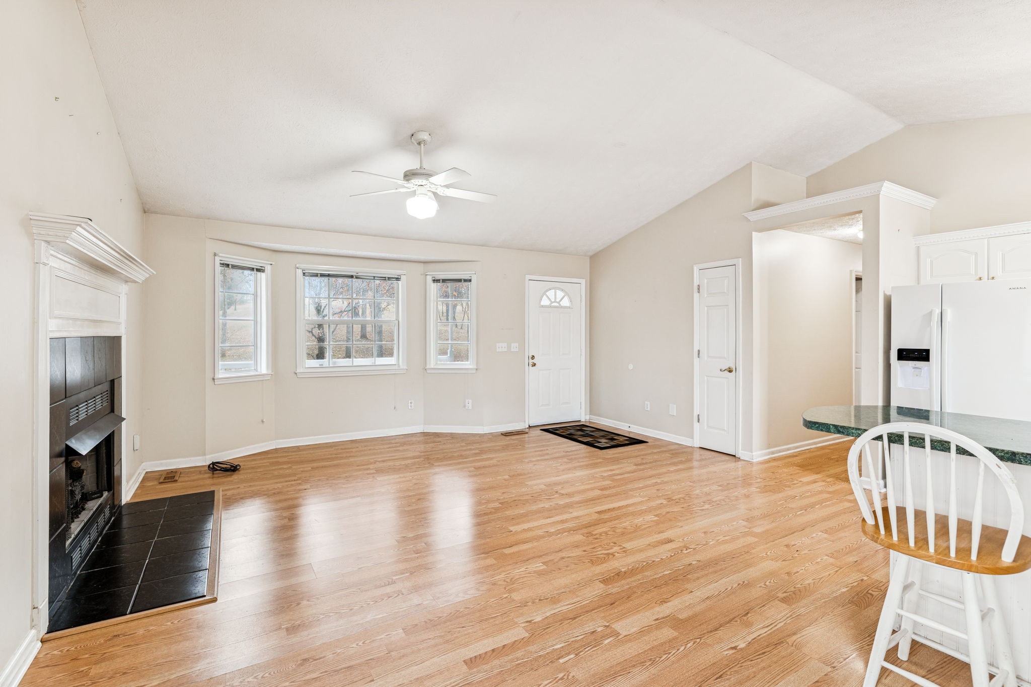 7399 Forest Glenn Road Fairview, TN 37062 - Photo 23 of 75 a view of an empty room with window and wooden floor
