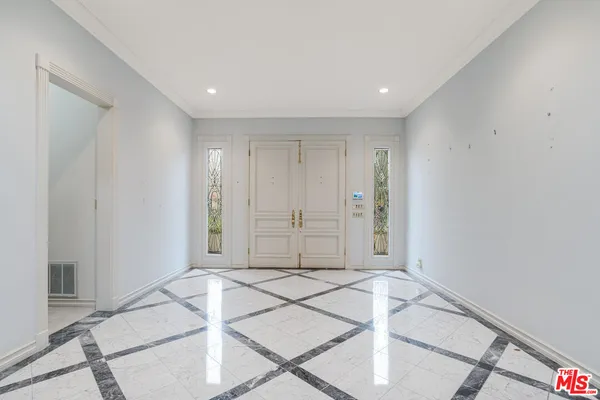 a view of a livingroom with wooden floor