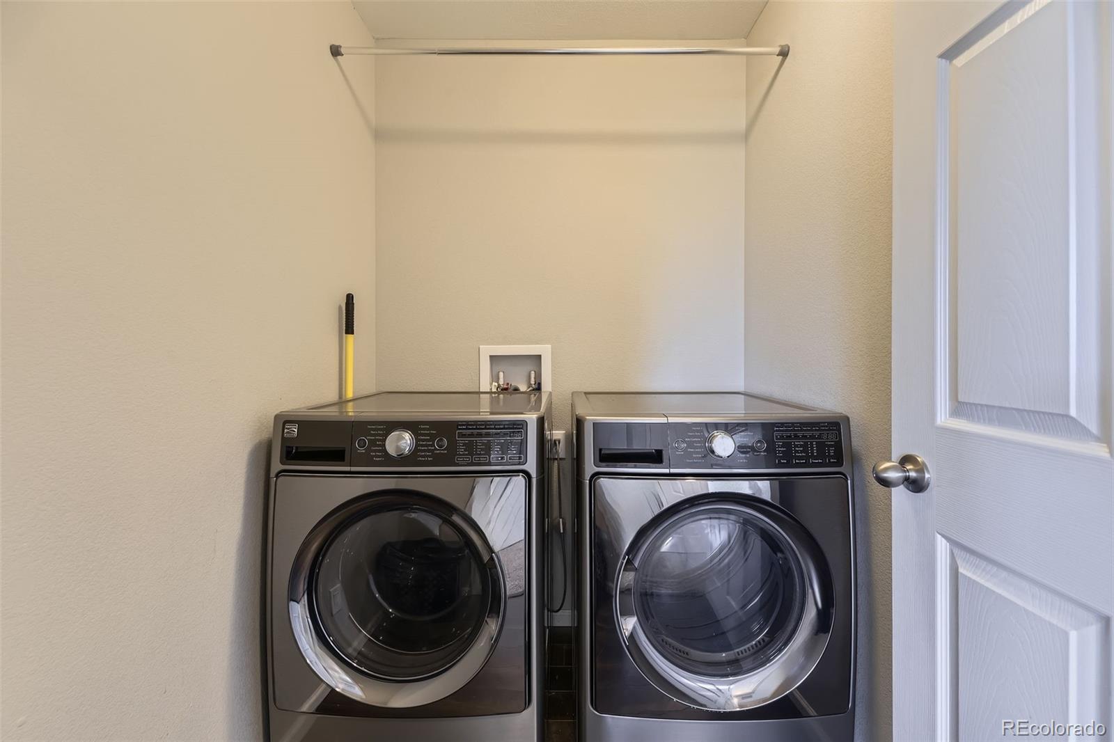 25621 East Cedar Place Aurora, CO 80018 - Photo 23 of 30 a utility room with dryer and washer