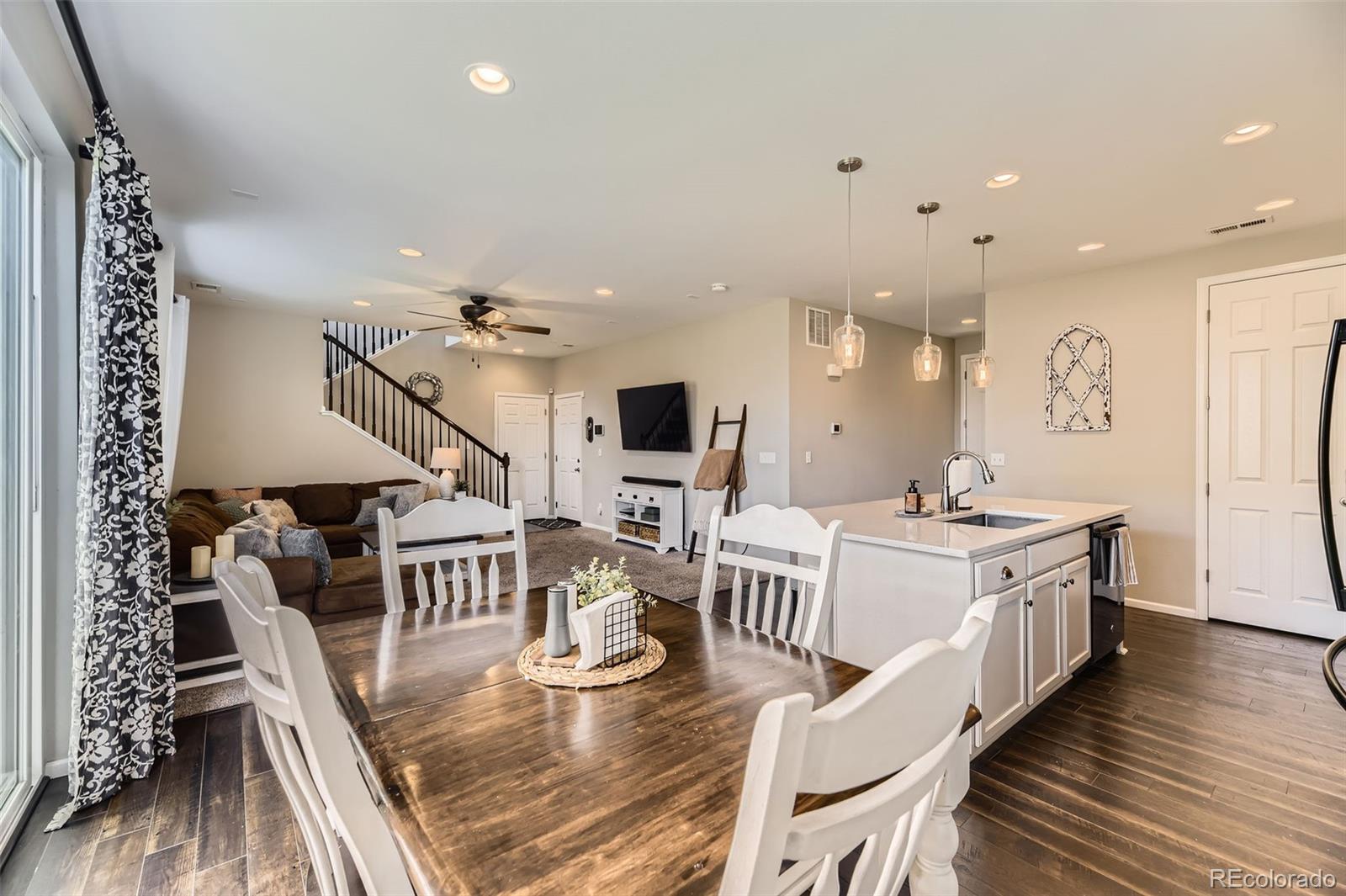 25621 East Cedar Place Aurora, CO 80018 - Photo 6 of 30 a large kitchen with sink and cabinets
