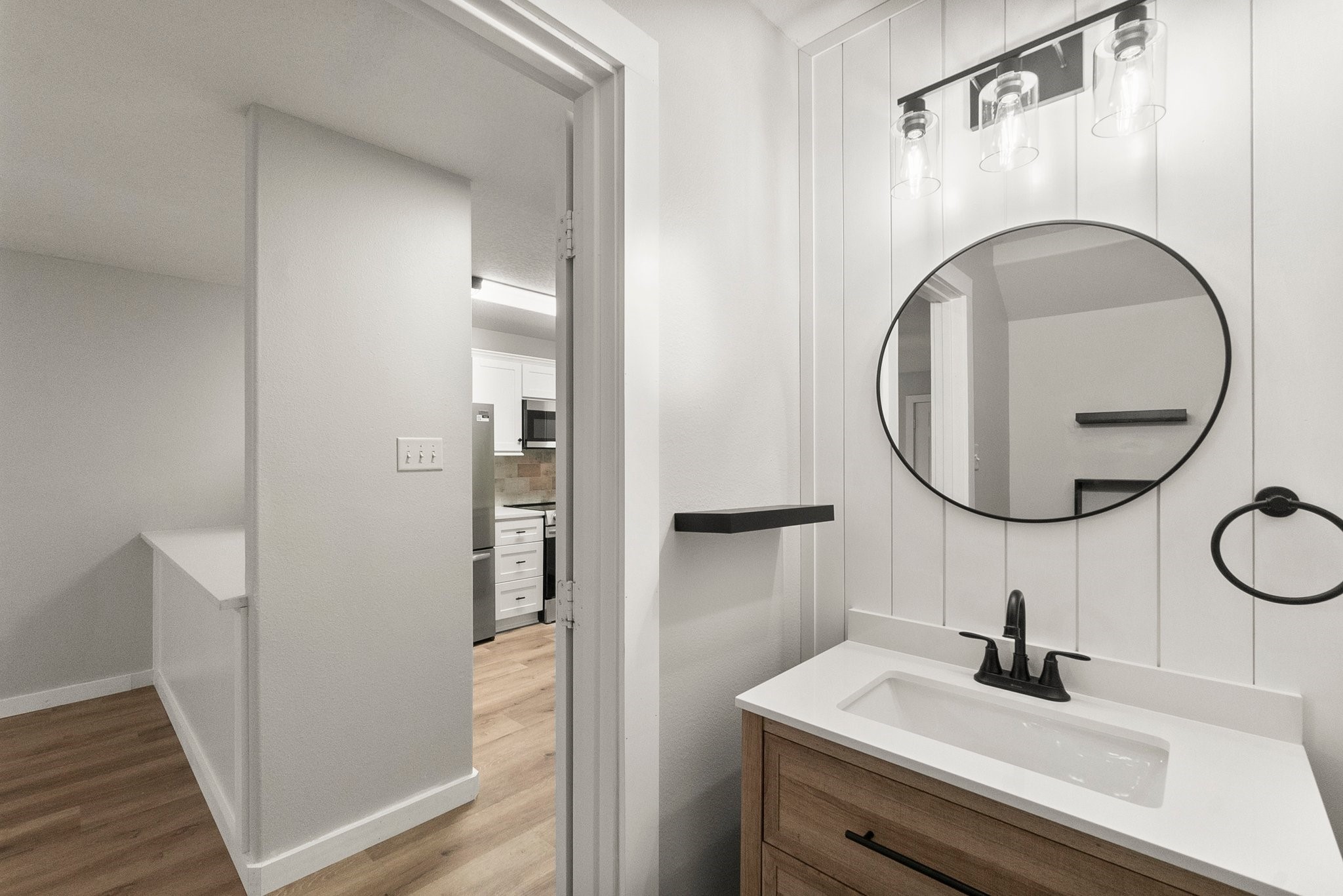 1799 League Line Road, Unit 4 Conroe, TX 77304 - Photo 15 of 34 a bathroom with a sink and a mirror