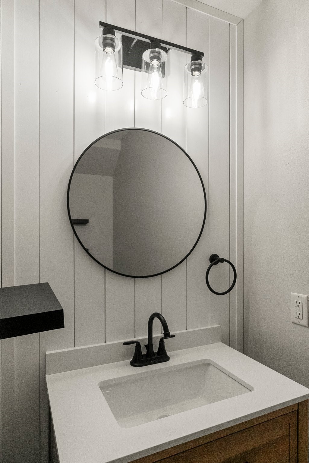 1799 League Line Road, Unit 4 Conroe, TX 77304 - Photo 18 of 34 a bathroom with a sink and a mirror
