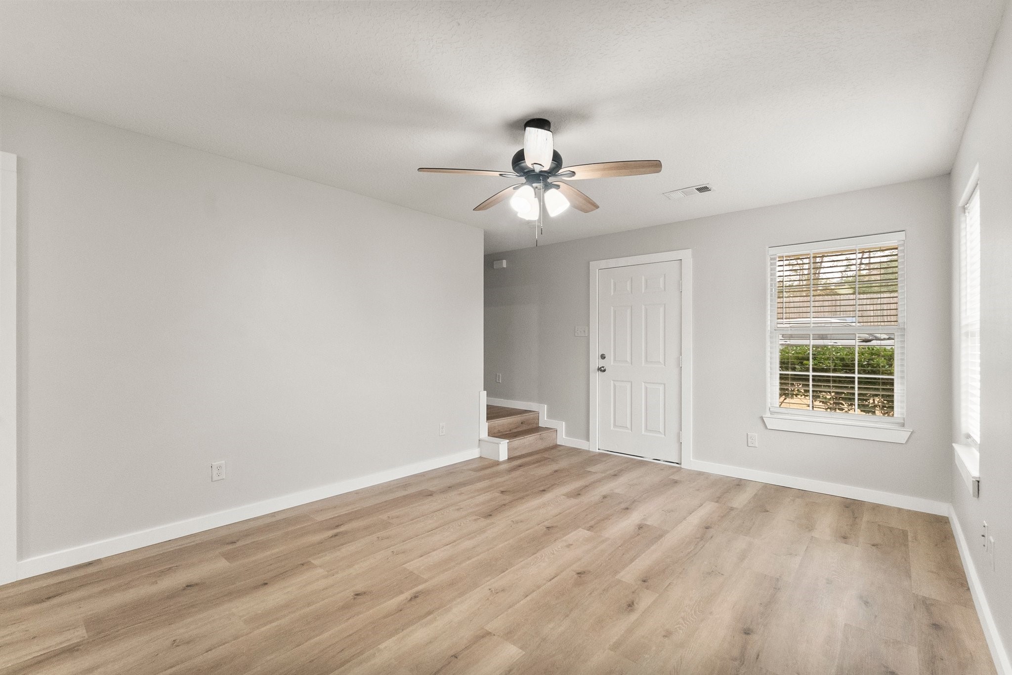 1799 League Line Road, Unit 4 Conroe, TX 77304 - Photo 2 of 34 a view of an empty room with a window