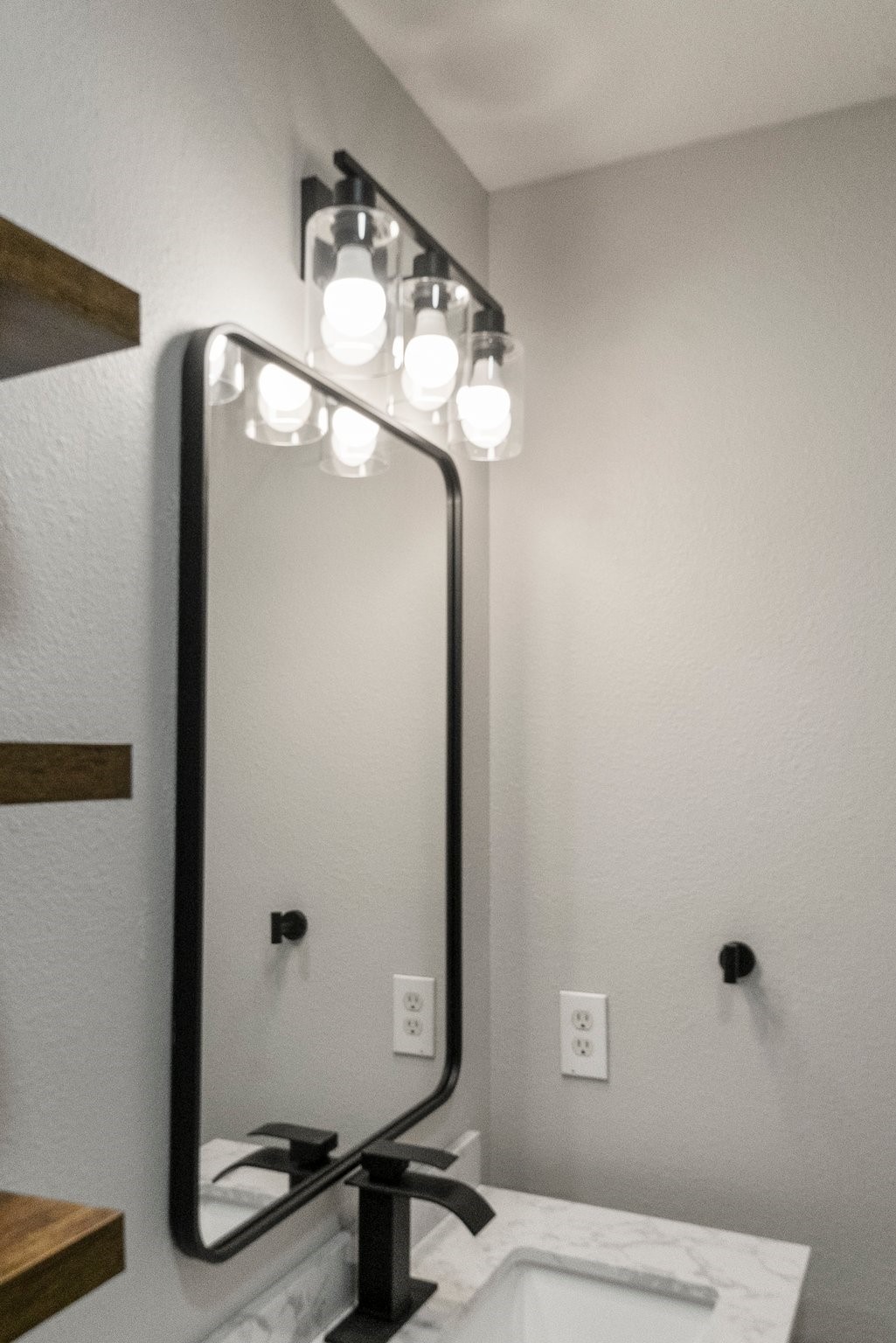 1799 League Line Road, Unit 4 Conroe, TX 77304 - Photo 25 of 34 a bathroom with a mirror and a shower