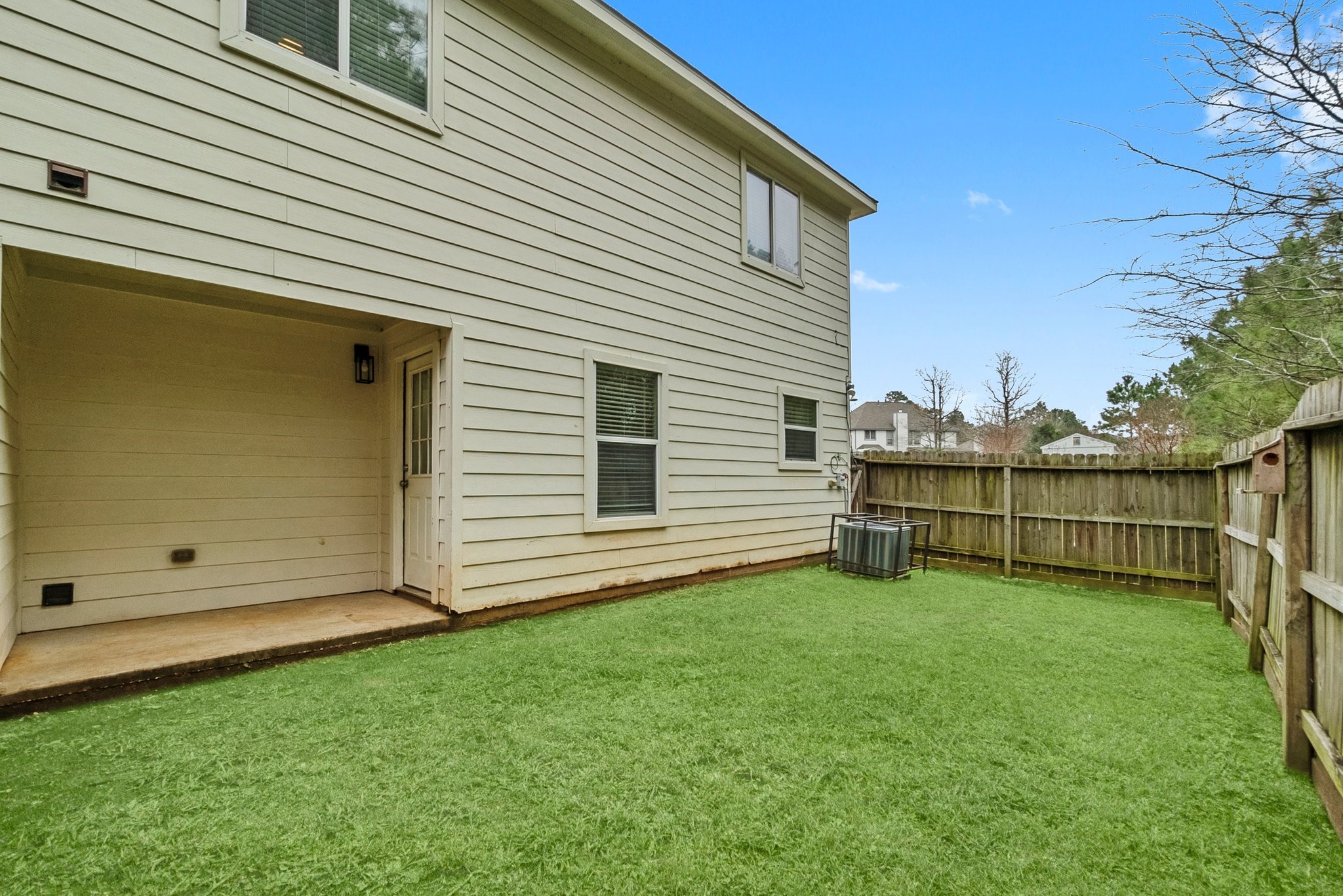 1799 League Line Road, Unit 4 Conroe, TX 77304 - Photo 34 of 34 a view of a backyard with fence