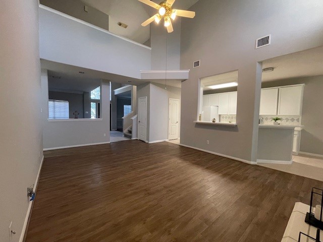 2202 Melanie Park Drive Spring, TX 77388 - Photo 13 of 21 a view of an empty room with wooden floor and a window