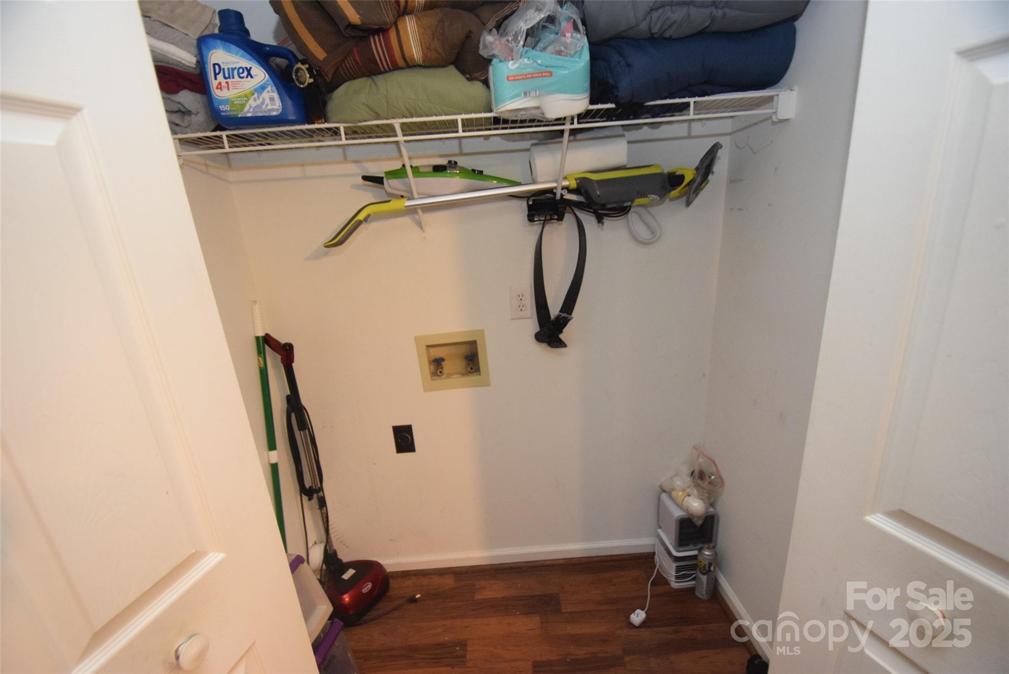 11130 Whitlock Crossing Court Charlotte, NC 28273 - Photo 15 of 27 a view of walk in closet with clothes and shoes