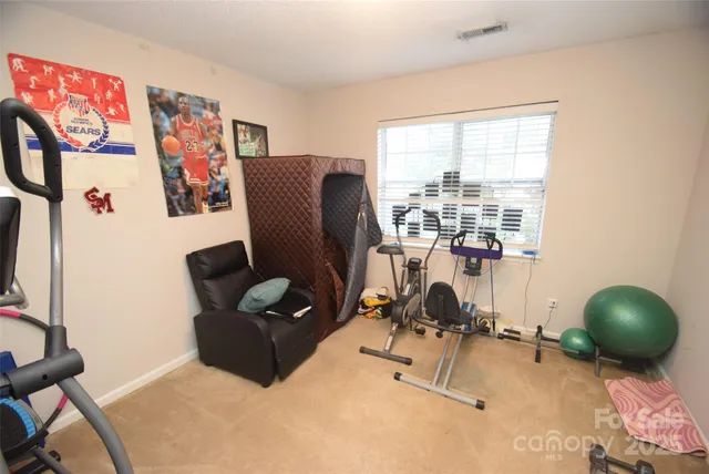 a room with furniture and a large window