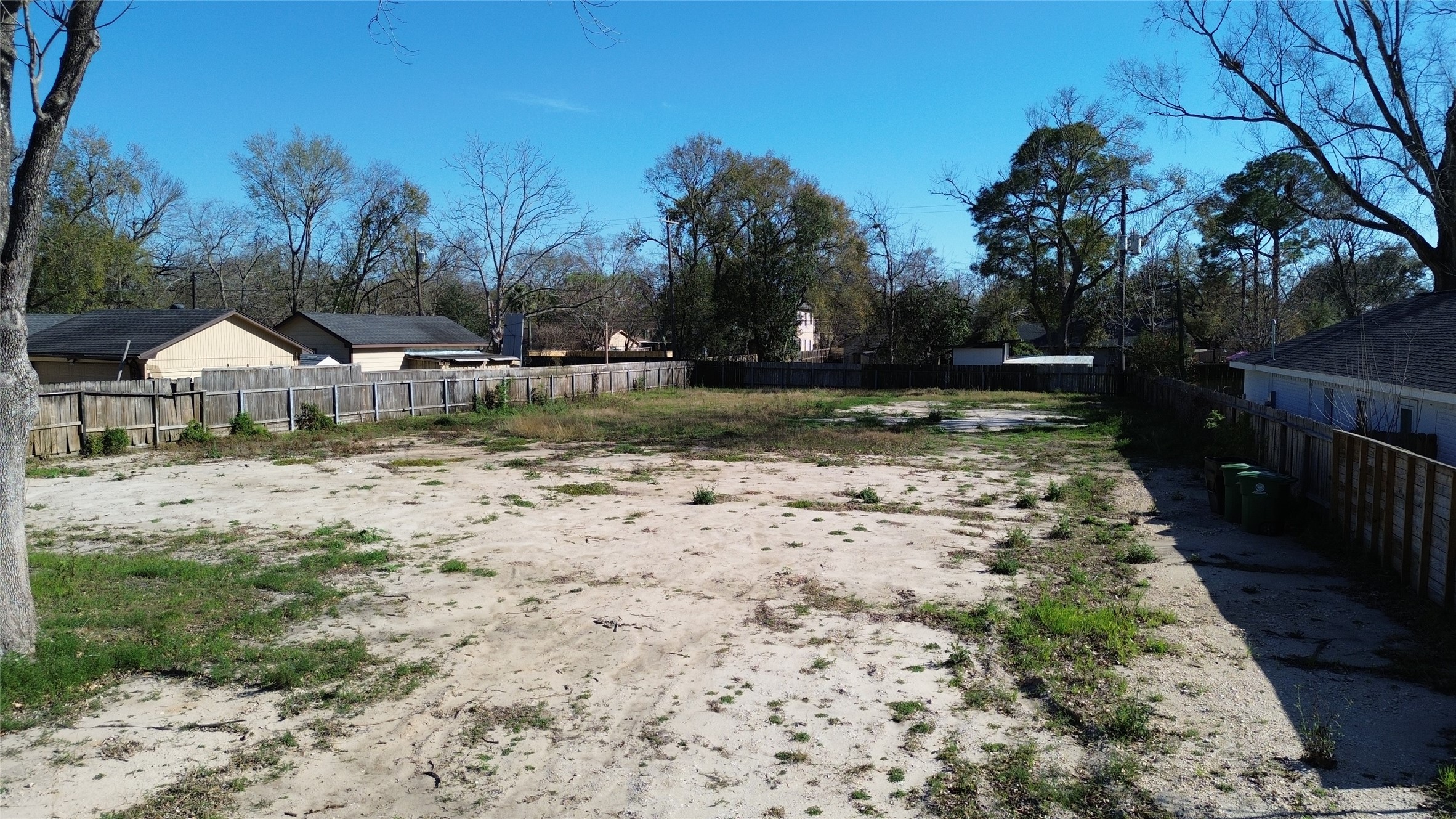 9309 Carousel Lane Houston, TX 77080 - Photo 4 of 8 a view of a yard with wooden fence