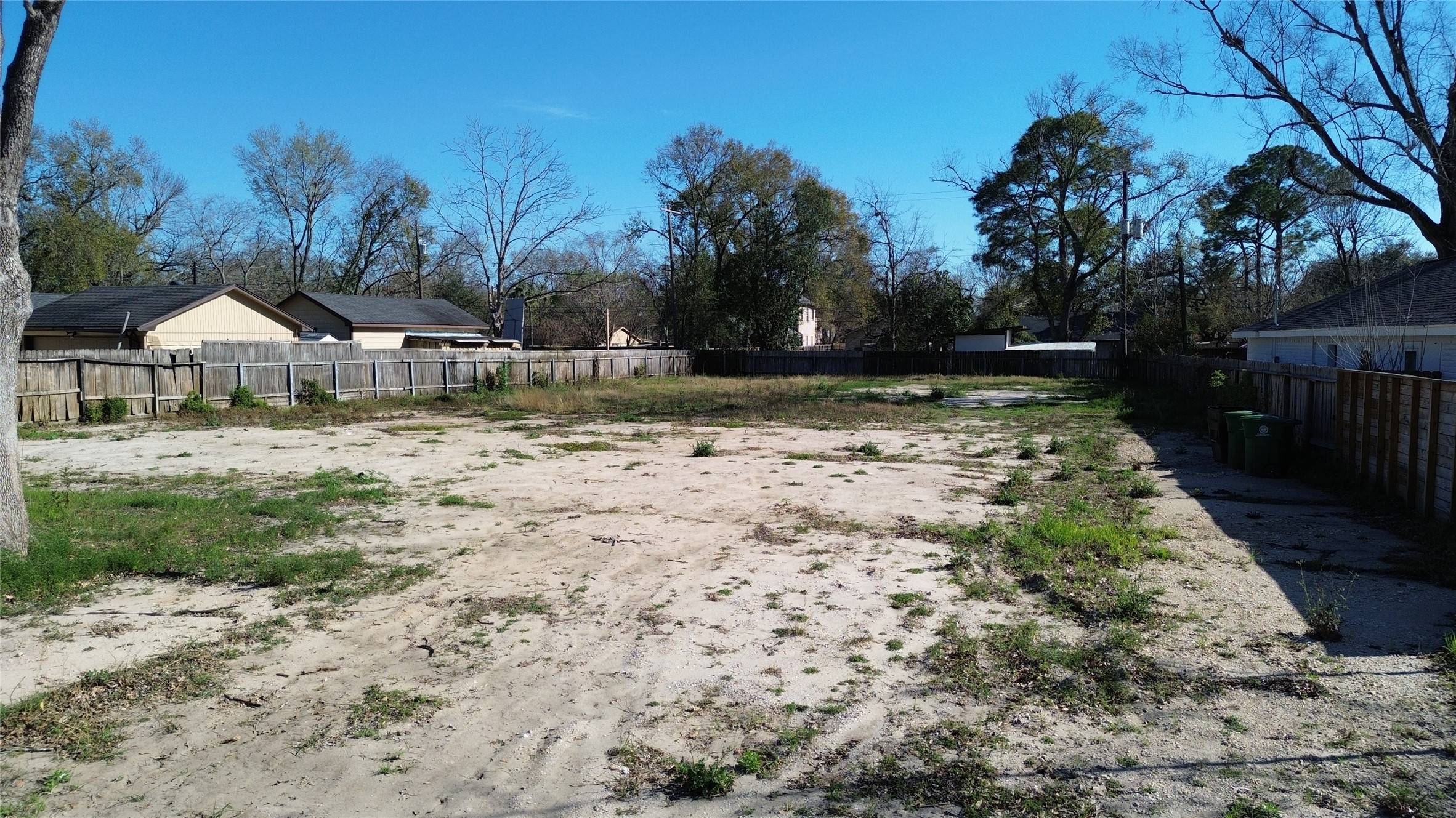 9309 Carousel Lane Houston, TX 77080 - Photo 8 of 8 a backyard of a house with lots of green space