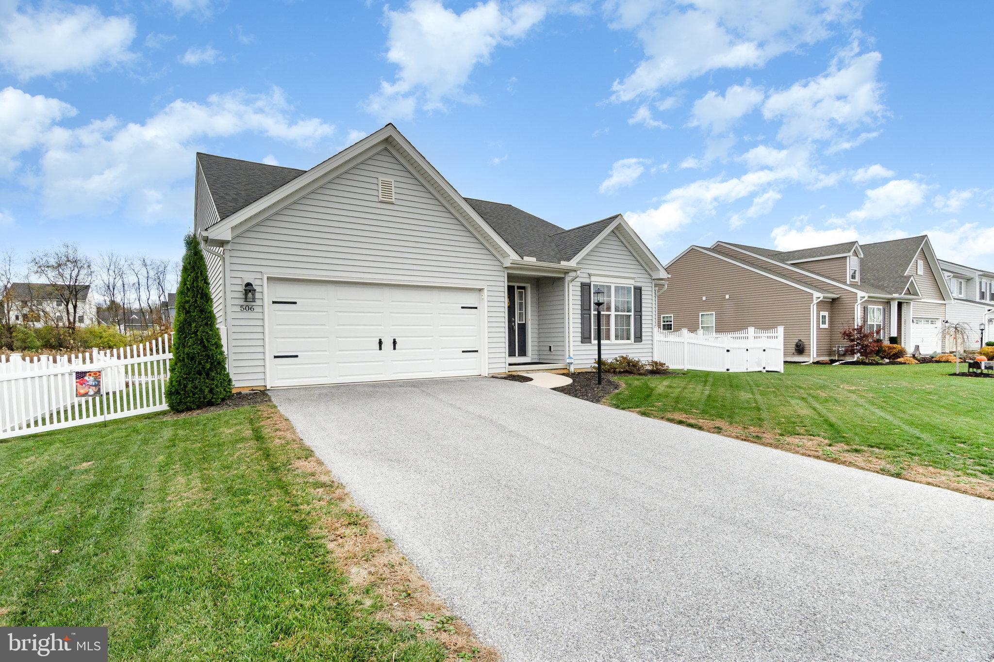 506 Granite Run Carlisle, PA 17015 - Photo 2 of 37 a view of a house with a yard and large tree