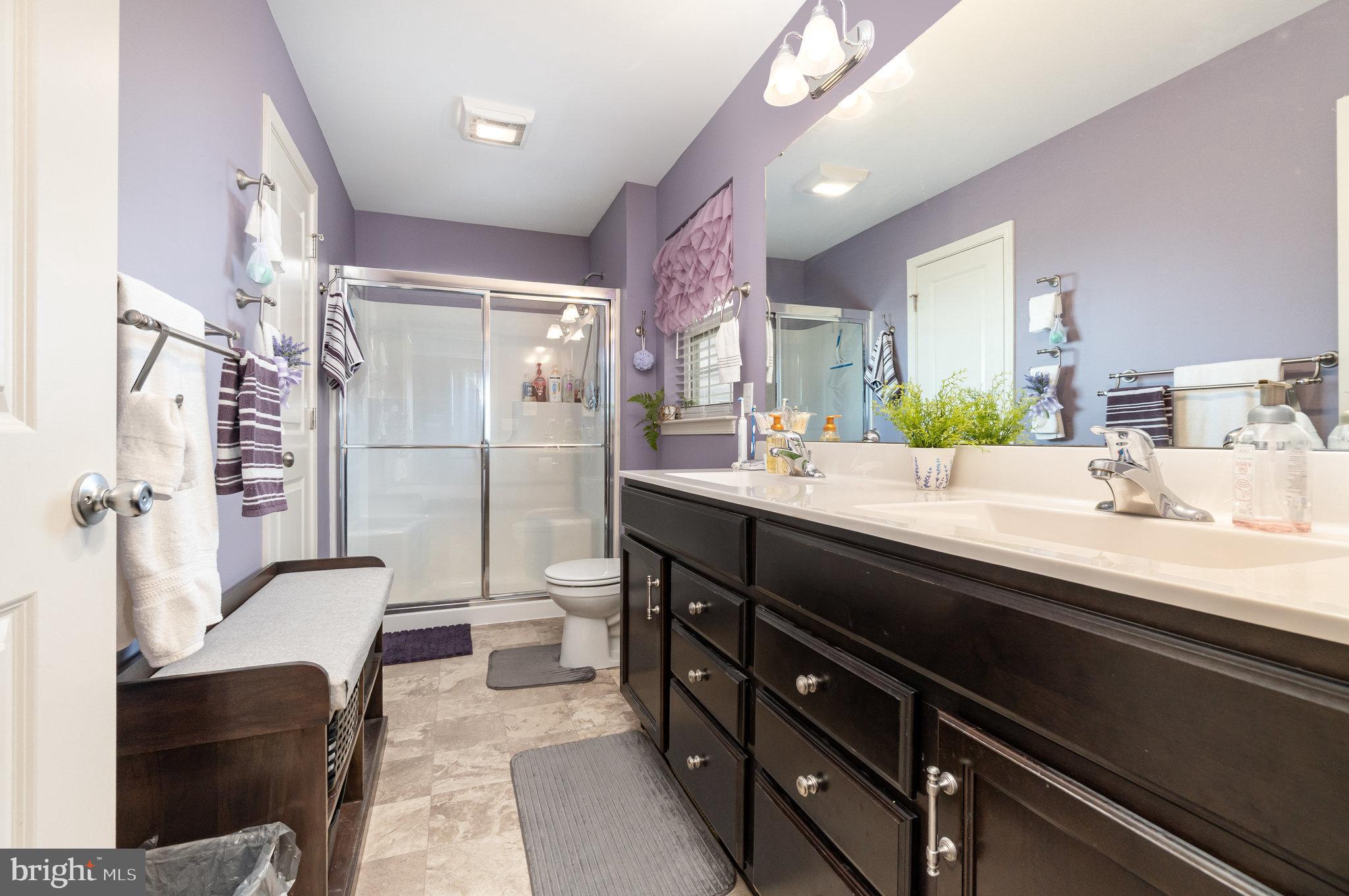 506 Granite Run Carlisle, PA 17015 - Photo 22 of 37 a bathroom with a double vanity sink double vanity and a shower