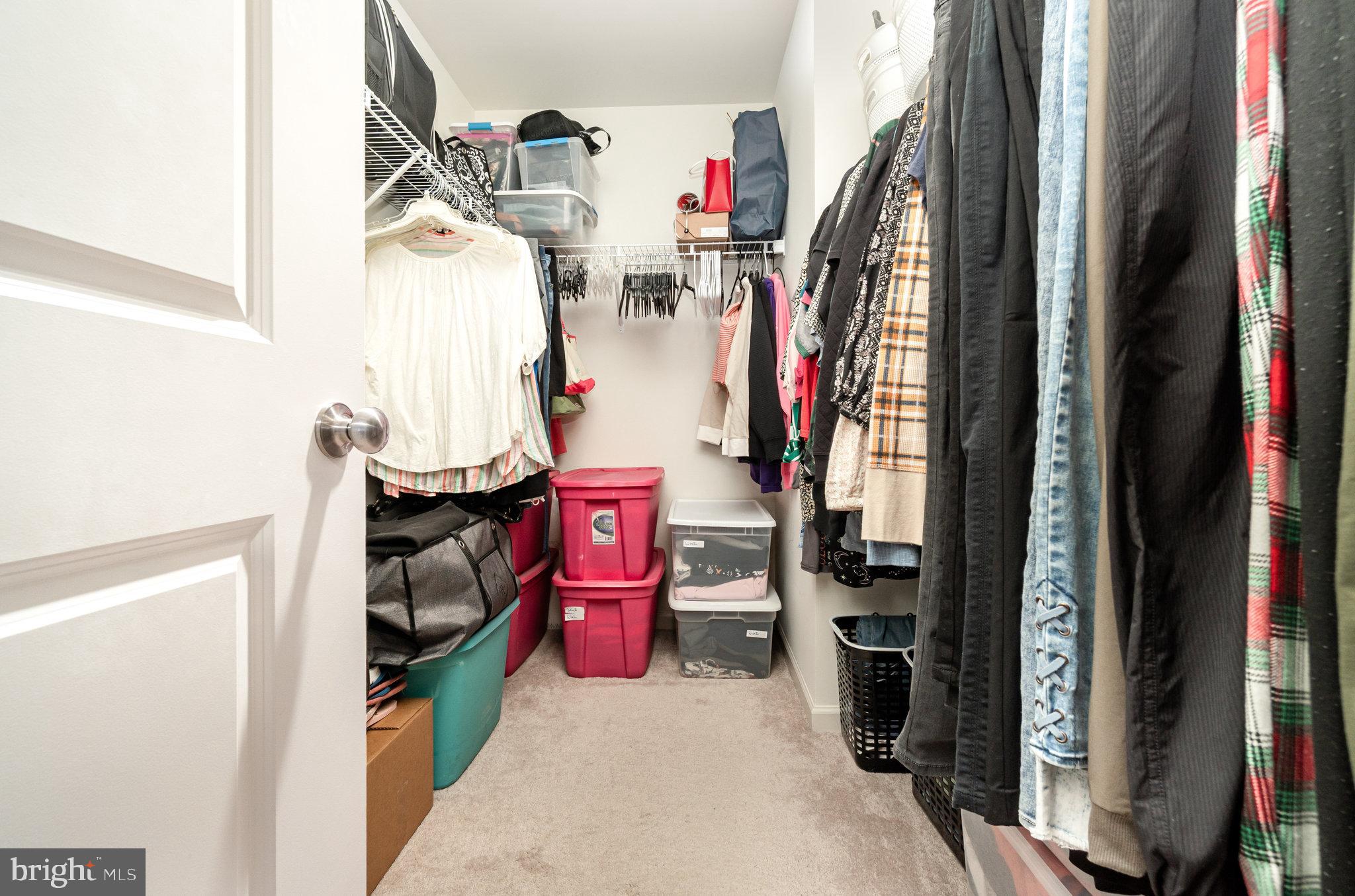 506 Granite Run Carlisle, PA 17015 - Photo 23 of 37 a view of walk in closet with clothes and shoes