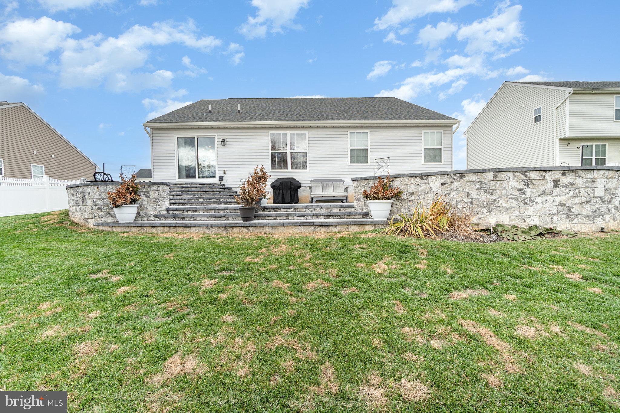 506 Granite Run Carlisle, PA 17015 - Photo 28 of 37 a front view of house with yard and seating area