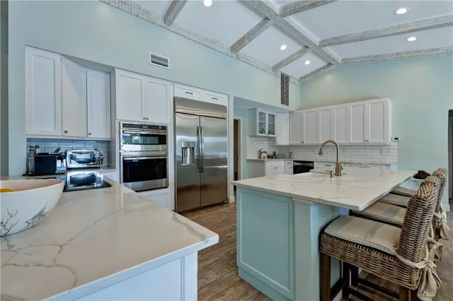 a view of storage and utility room with closet