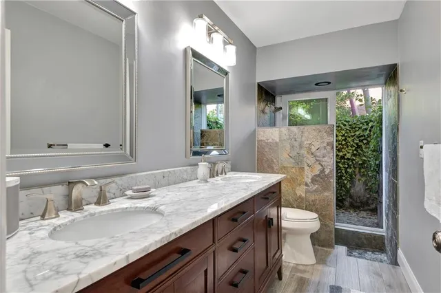 a view of a workspace with furniture and a chandelier