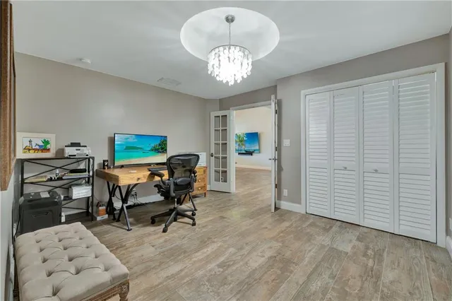 a bed room with a bed and a window