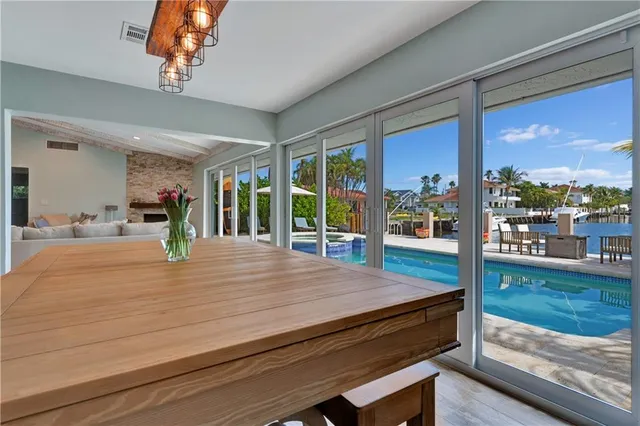 a bathroom with a shower a sink and a mirror