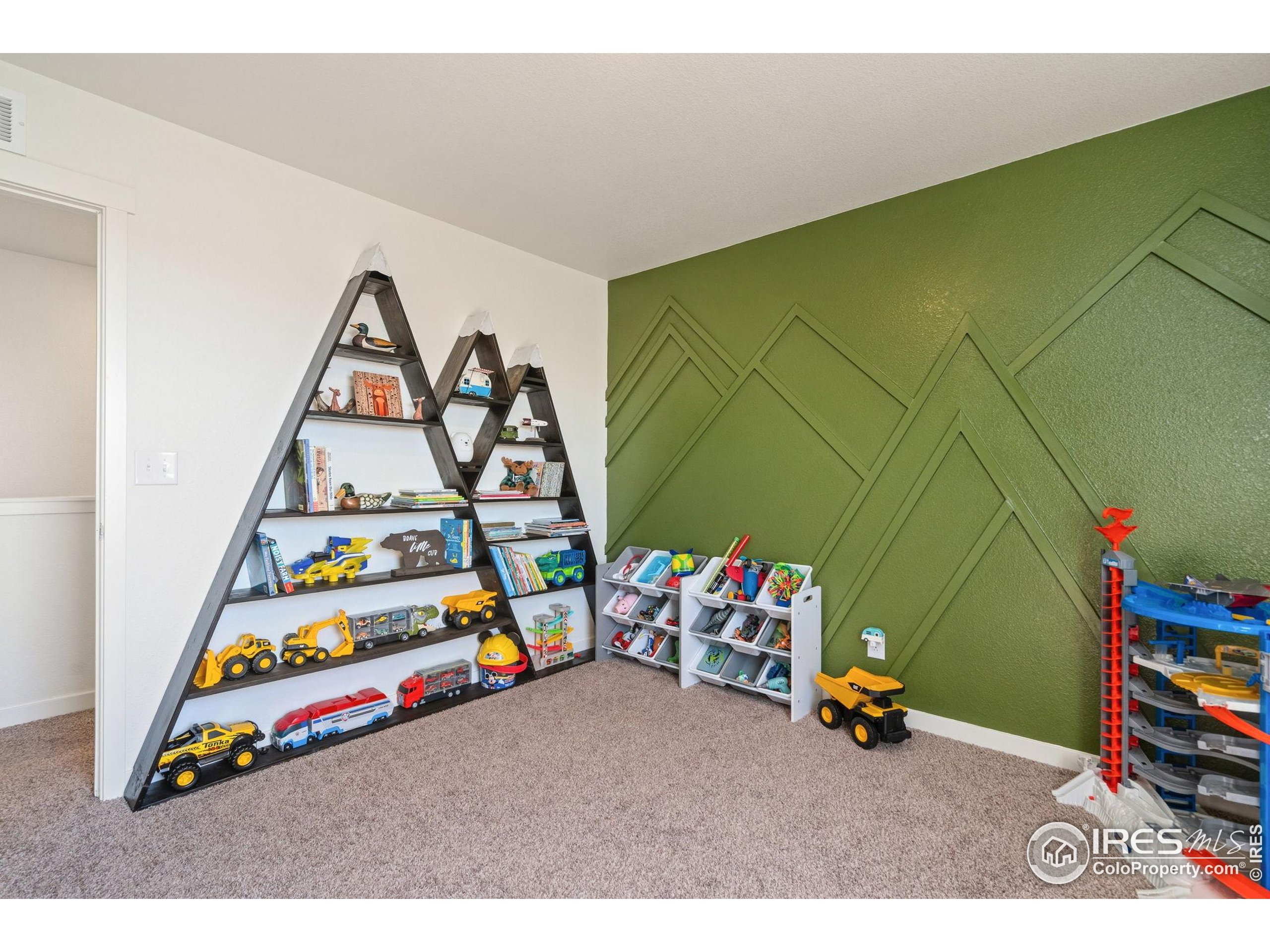 1233 Lily Mountain Road Severance, CO 80550 - Photo 28 of 44 a play room with toys