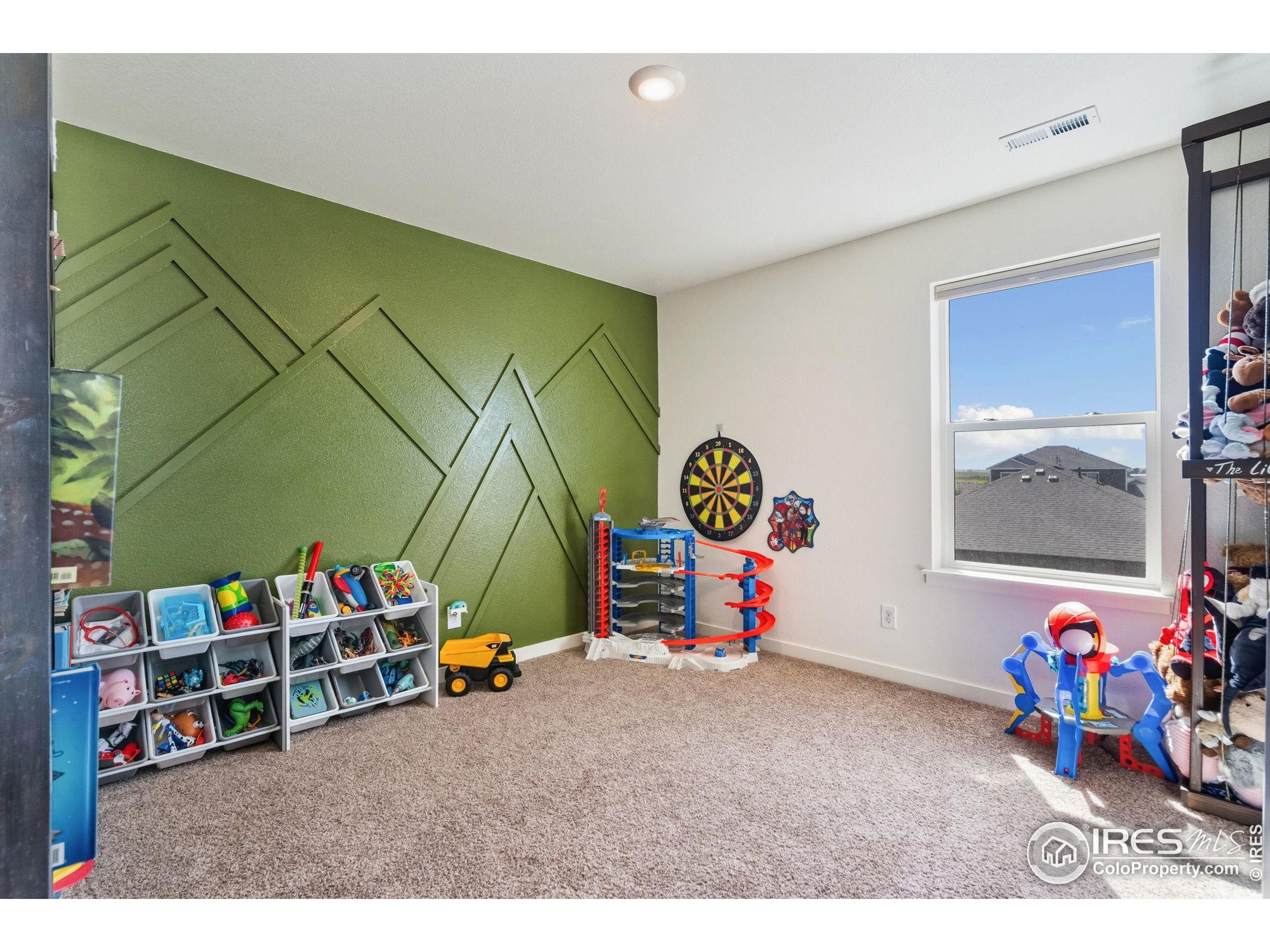1233 Lily Mountain Road Severance, CO 80550 - Photo 29 of 44 a play room with toys