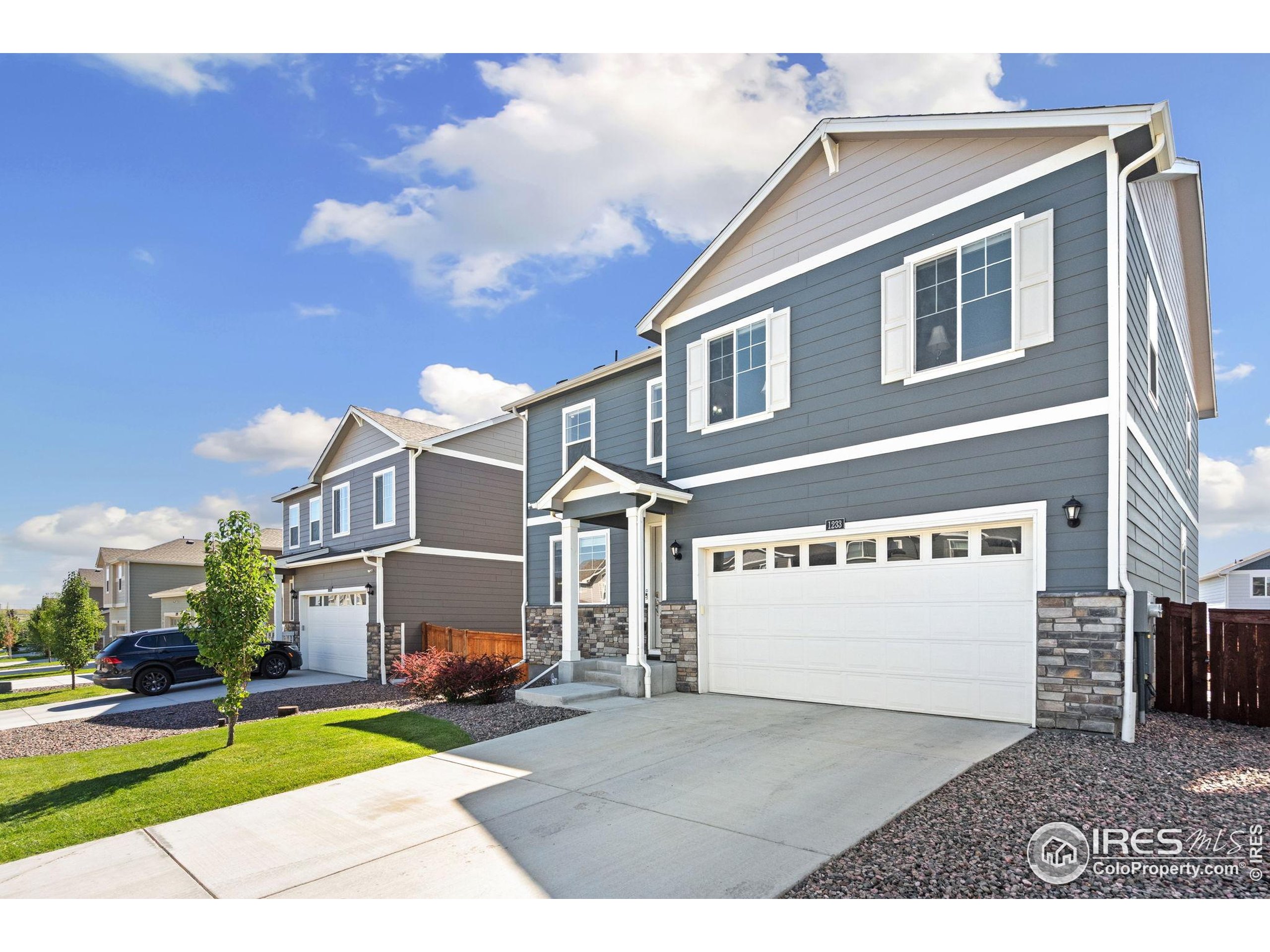 1233 Lily Mountain Road Severance, CO 80550 - Photo 3 of 44 a view of a building with a street