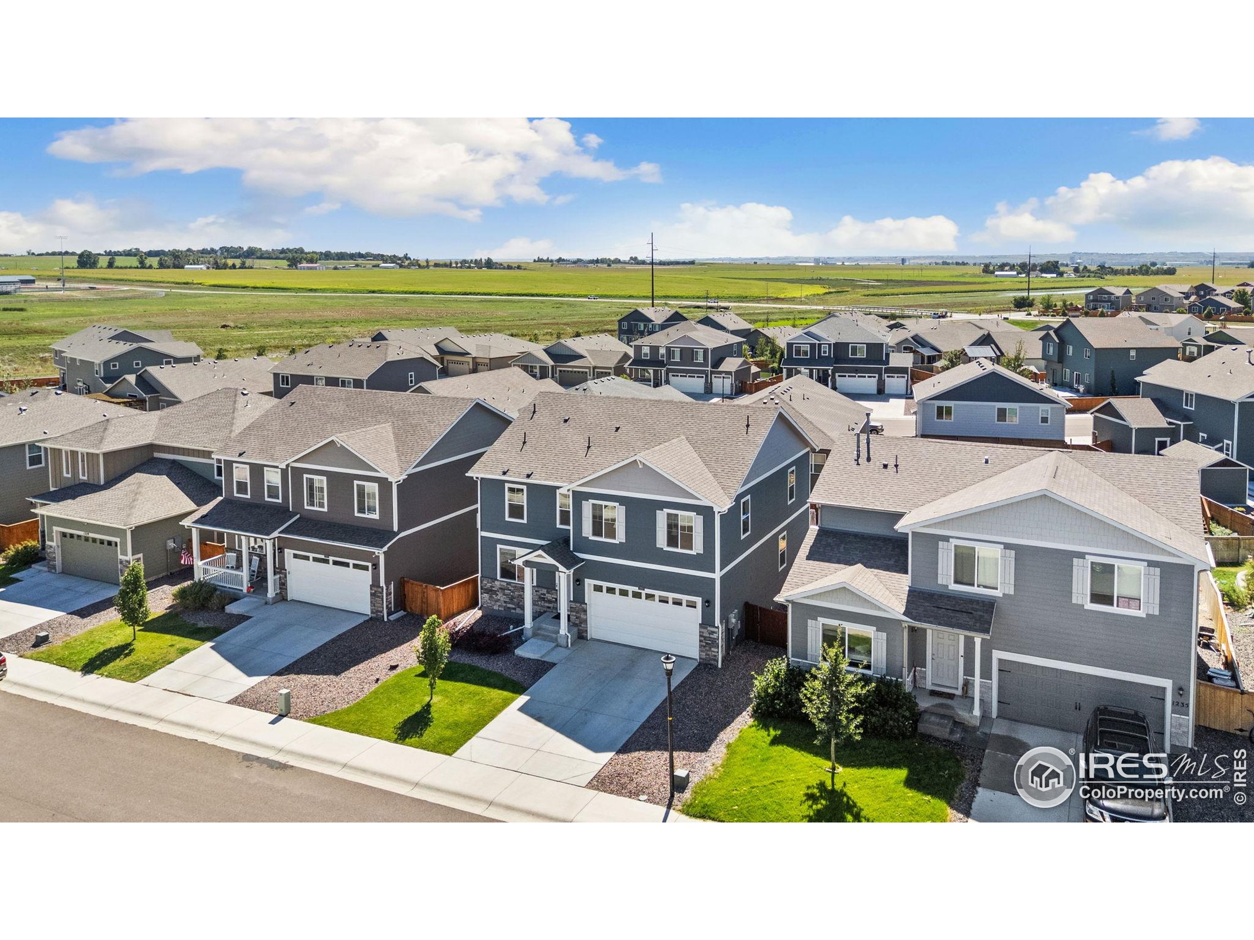 1233 Lily Mountain Road Severance, CO 80550 - Photo 42 of 44 a view of a city with an ocean view