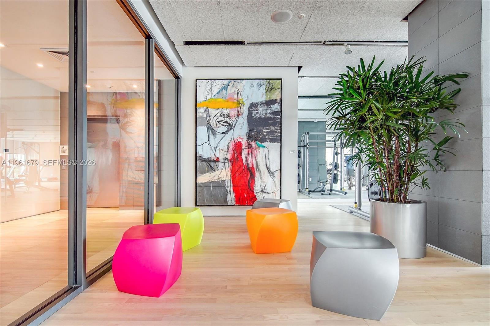 460 Northeast 28th Street, Unit 1601 Miami, FL 33137 - Photo 25 of 41 a living room with furniture and a potted plant