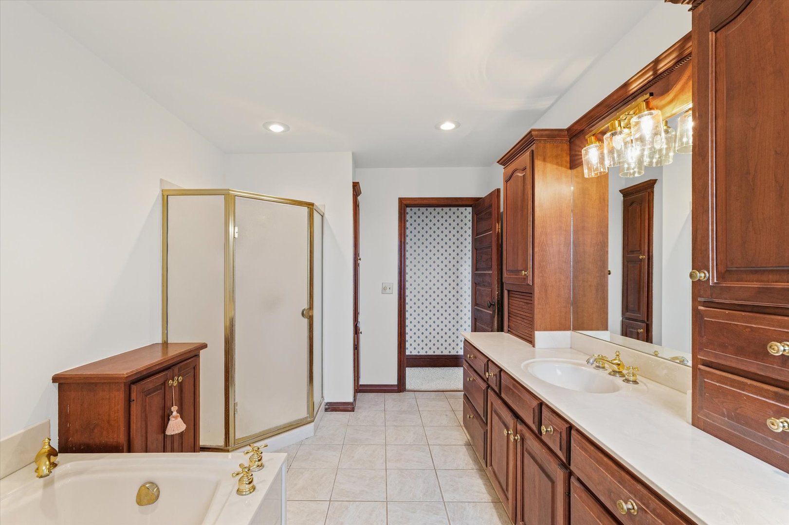 7961 North 3000 E Road Forrest, IL 61741 - Photo 34 of 66 a bathroom with a double vanity sink and mirror
