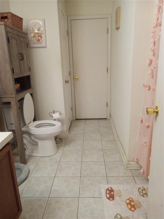 10933 Subtle Trail Drive Riverview, FL 33579 - Photo 22 of 22 a bathroom with a toilet and a shower