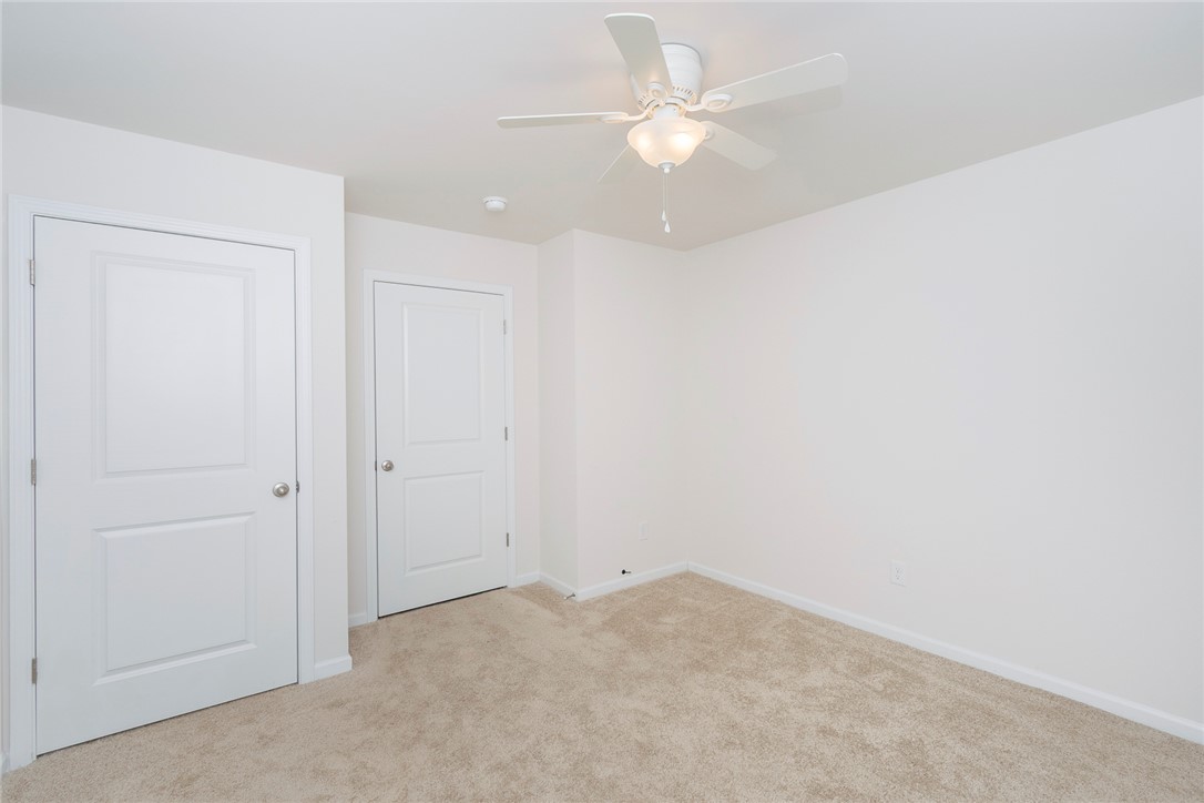 231 Millhone Way Pendleton, SC 29670 - Photo 12 of 32 This spacious room features neutral tones and ample natural light, creating a bright and inviting atmosphere.