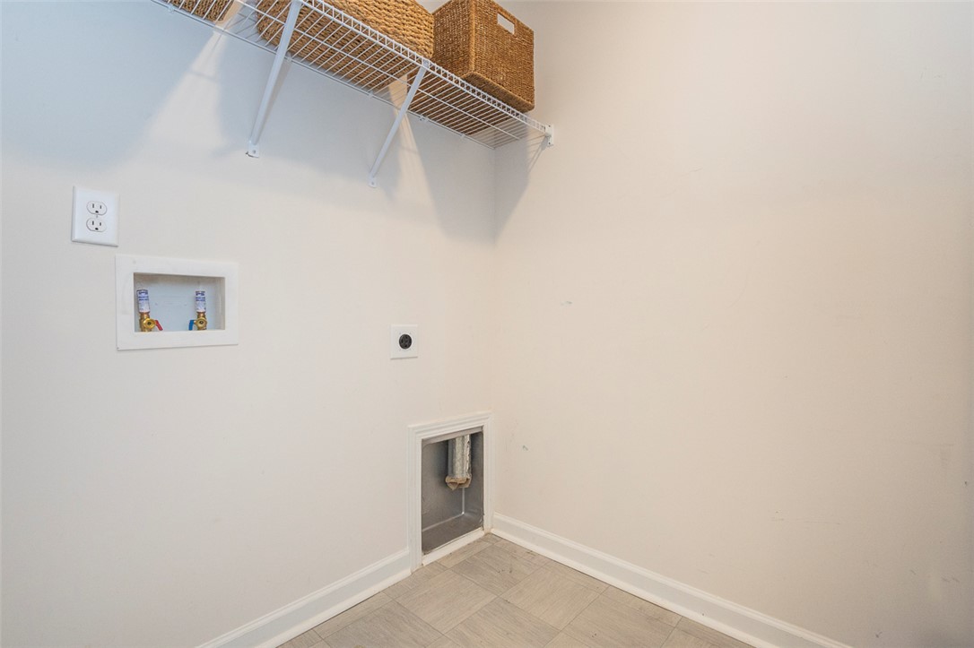 231 Millhone Way Pendleton, SC 29670 - Photo 26 of 32 Functional laundry space with essential hookups and convenient overhead shelving.