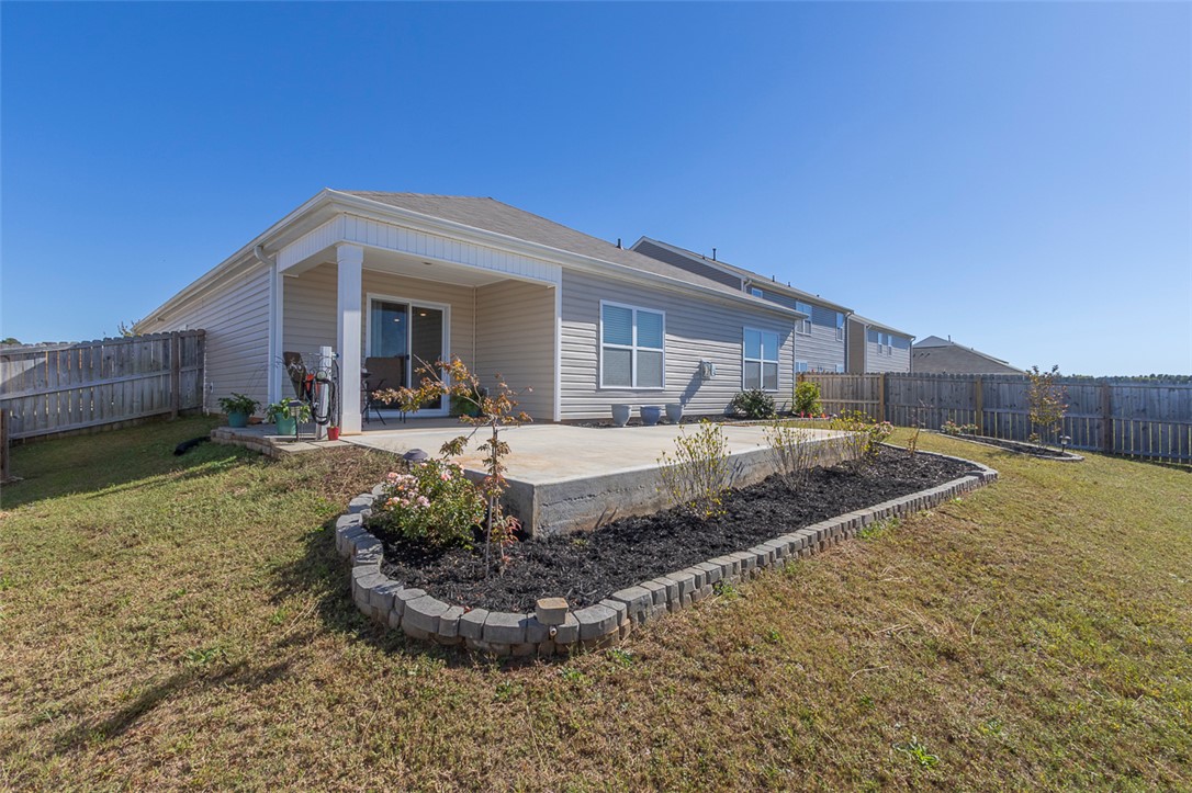 231 Millhone Way Pendleton, SC 29670 - Photo 30 of 32 Enjoy outdoor living on this inviting patio with a manicured backyard.