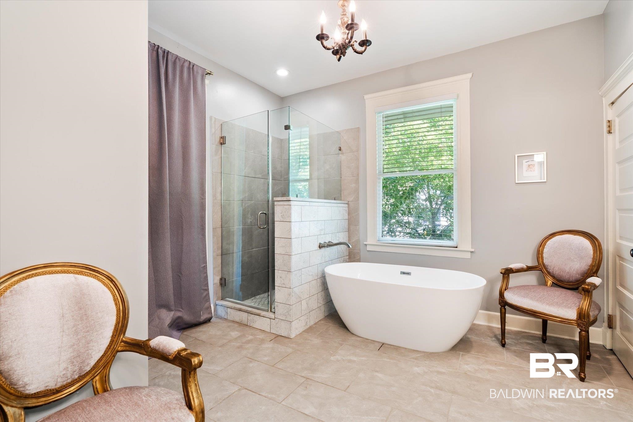 68 North Monterey Street Mobile, AL 36604 - Photo 19 of 30 Bathroom with tile patterned floors, walk in shower, and an inviting chandelier