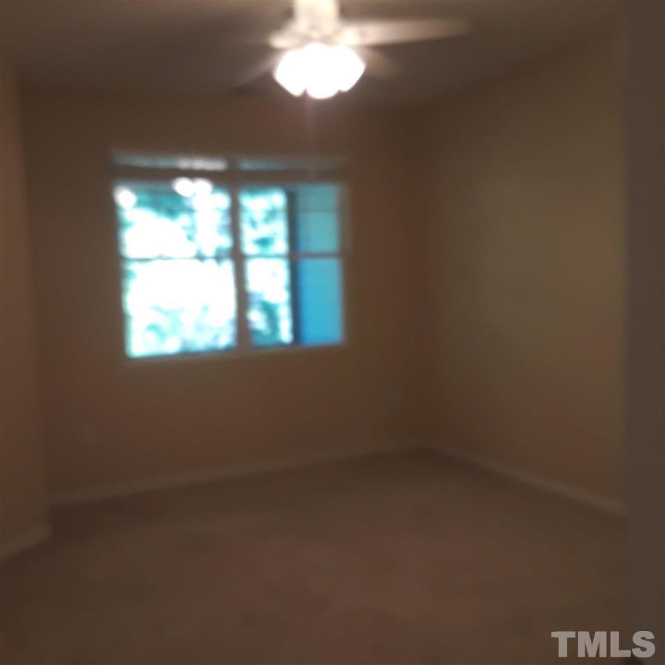 625 Briarcliff Street Apex, NC 27502 - Photo 11 of 18 a view of an empty room with a window