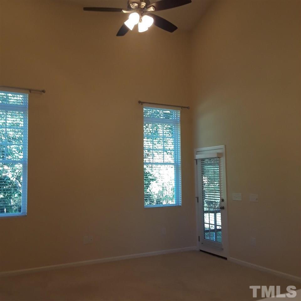625 Briarcliff Street Apex, NC 27502 - Photo 8 of 18 a view of an empty room with a window