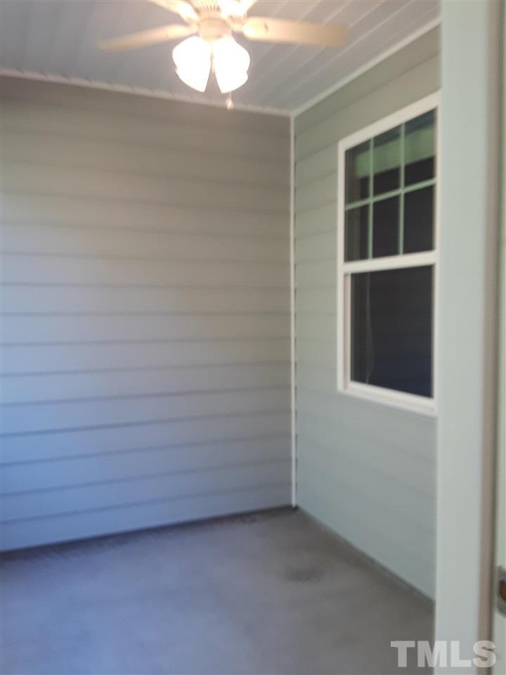 625 Briarcliff Street Apex, NC 27502 - Photo 10 of 18 a view of an empty room with a window