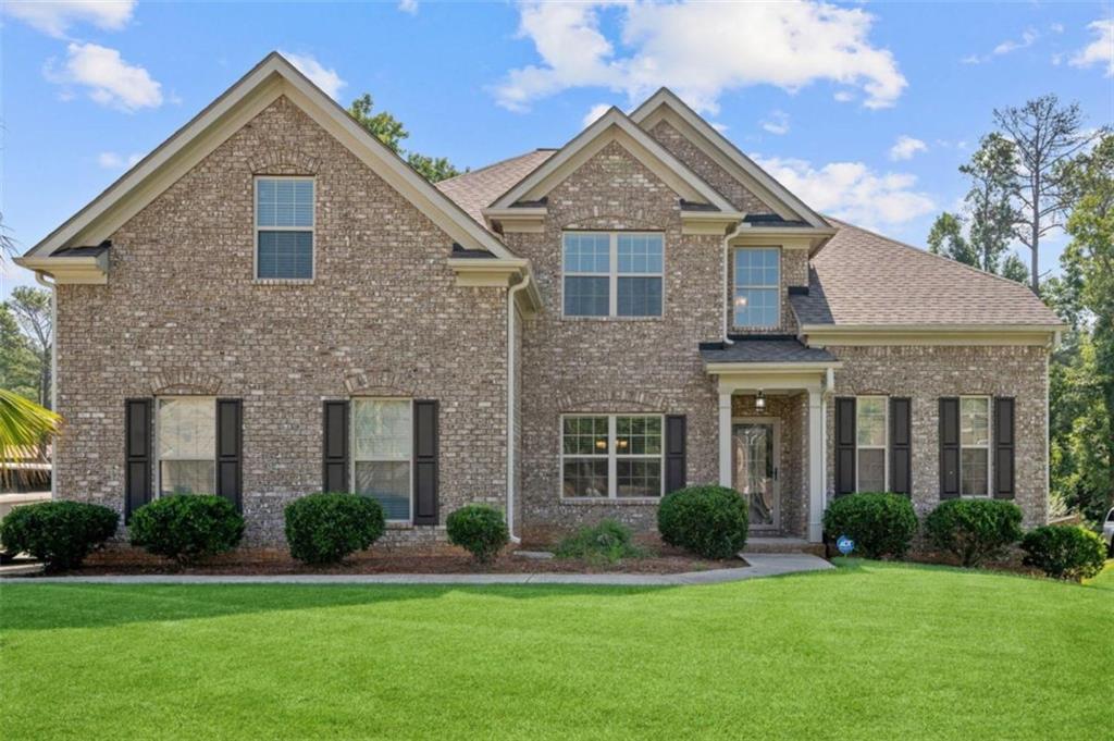 2766 Hilson Commons Decatur, GA 30034 - Photo 1 of 1 a front view of a house with a yard