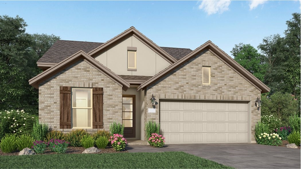 9303 Captain Terrace Drive Baytown, TX 77521 - Photo 28 of 28 a front view of a house with a yard and garage