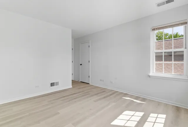 an empty room with windows