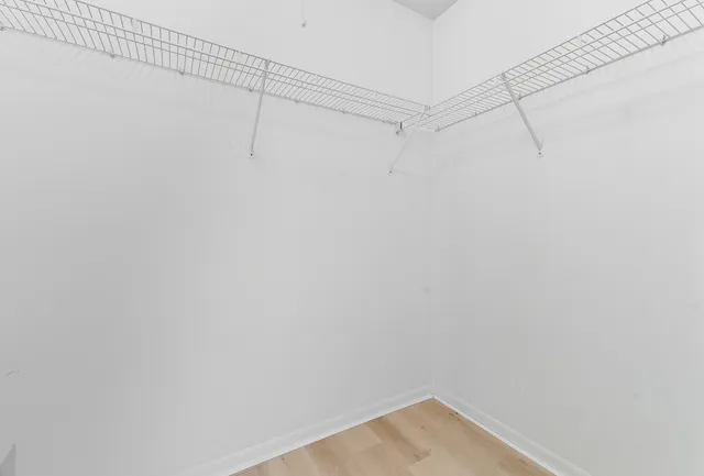 a view of a room with racks on the wall