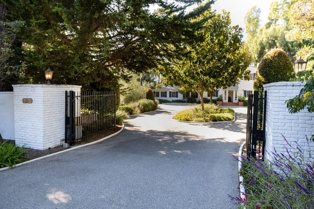 a view of a patio with swimming pool